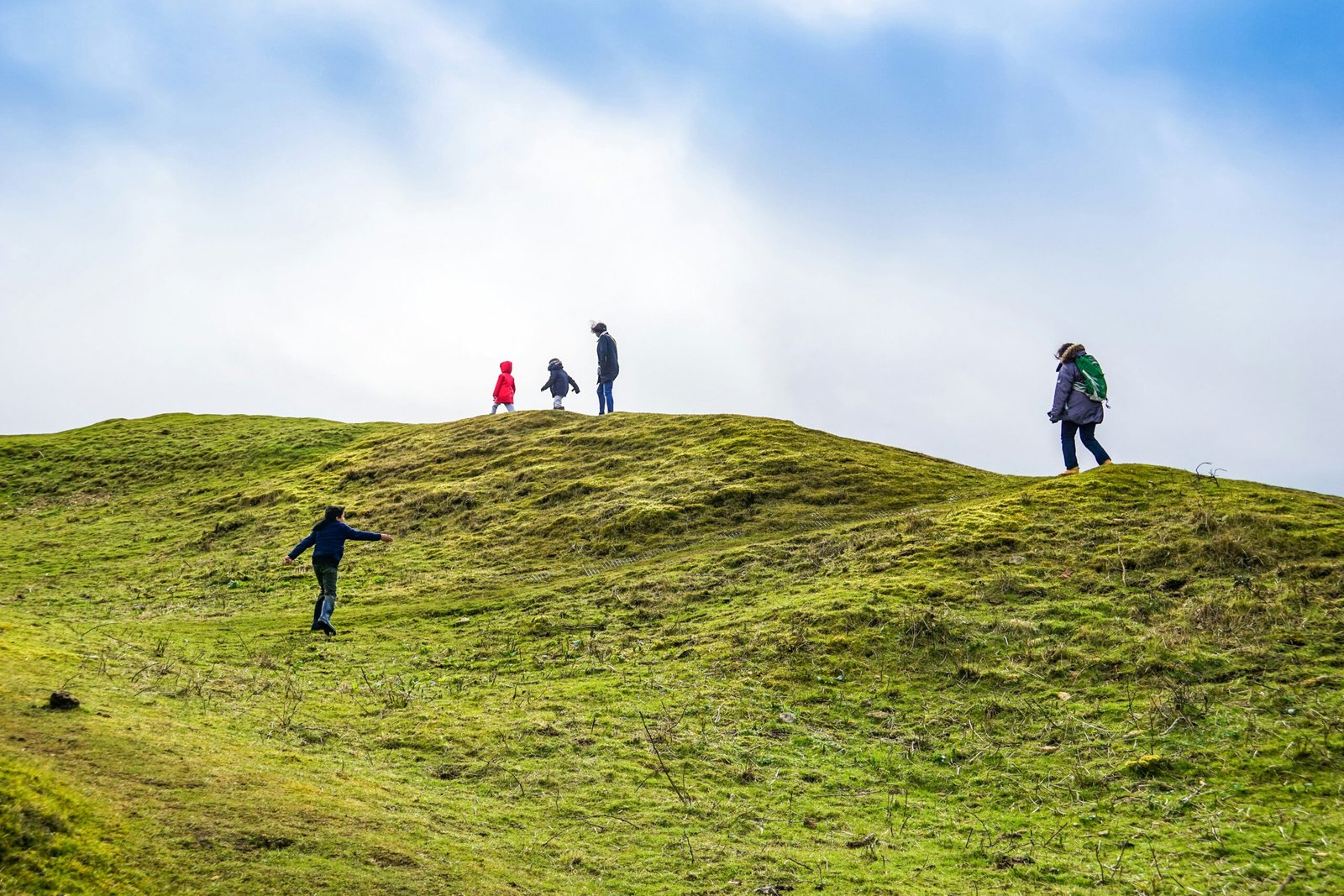 several people on mountain top